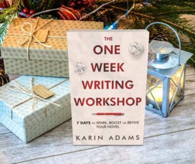 copy of The One Week Writing Workshop book by Karin Adams with gifts at the base of a Christmas tree